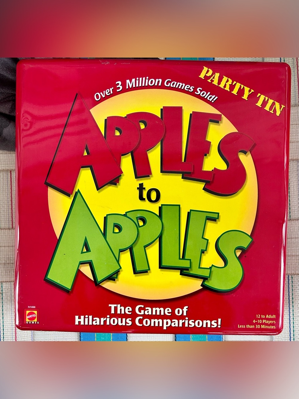 Apples to Apples game in Tim, gently used, one pack cards unopened